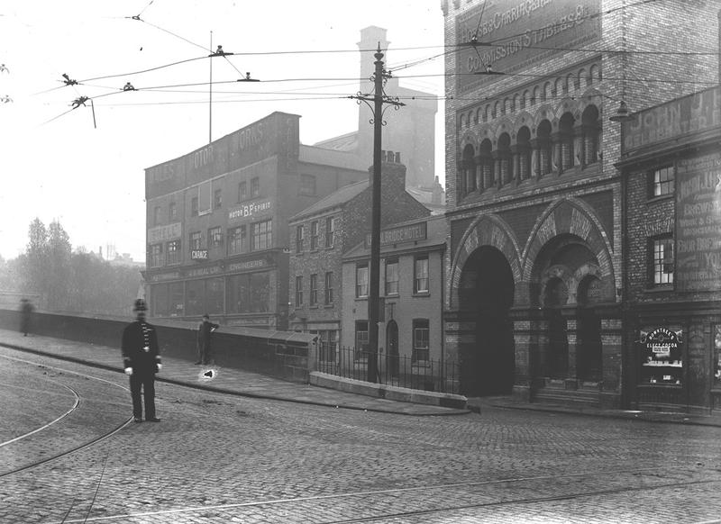 Police officer directing traffic at junction of Tanner Moat, Lendal Bridge and Railway Street, 1920s.