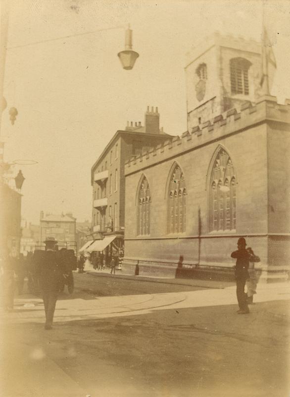 Police officer on duty in front of St Michael's Church, 1890s.
