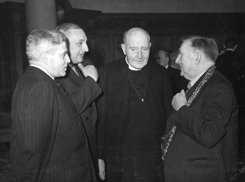 The Archbishop of York and the Lord Mayor with Luther Reid, from the United States Embassy, and Frederic Hudd, Deputy to the High Commissioner for Canada.