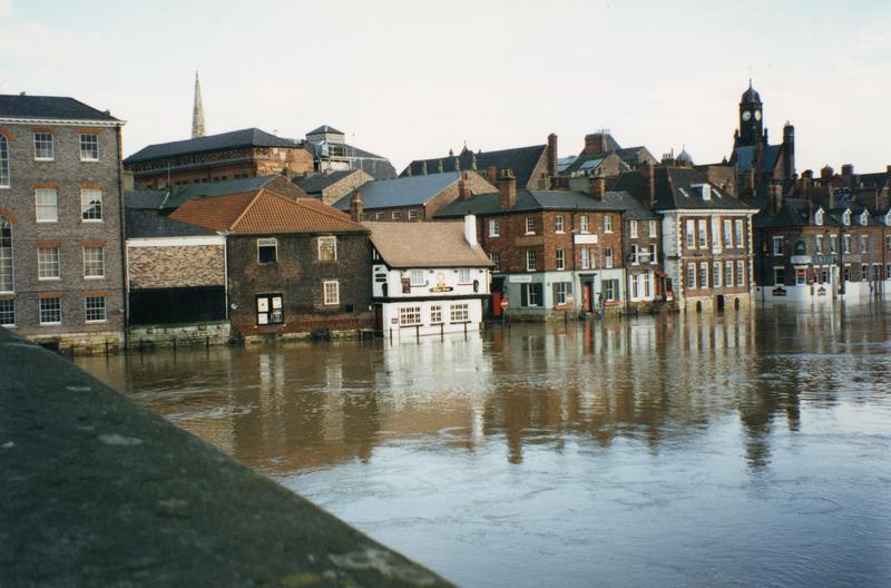 Flood waters over King's Staith from Ouse Bridge, 1990s.