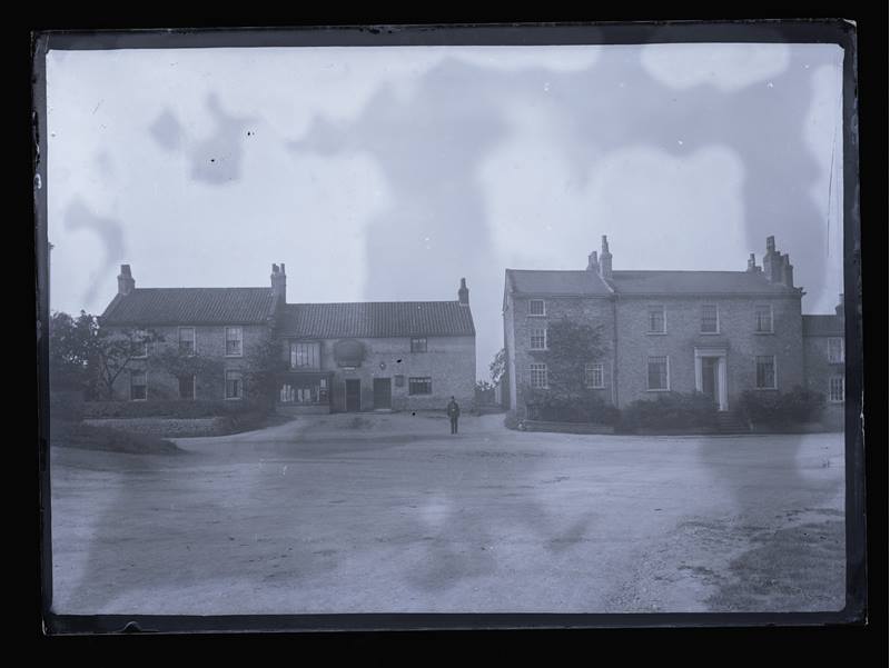 Row of unidentified houses, c.1900