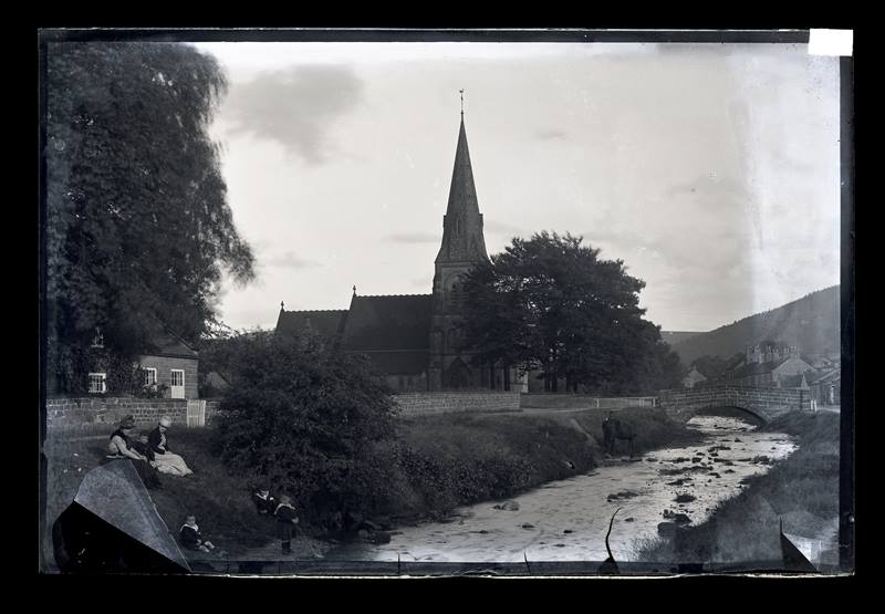Unidentified village, including church with spire, c.1900